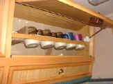 cupholder in cupboard